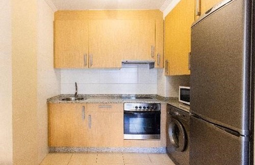 Fazouro Apartment | Two-Bedroom URB. FOZ II: Family-Friendly with Pool Access