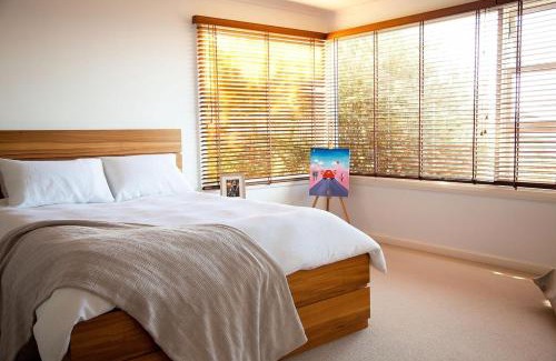 Blackmans Bay House | Urban Farm Stay with Scenic Water Views for Families