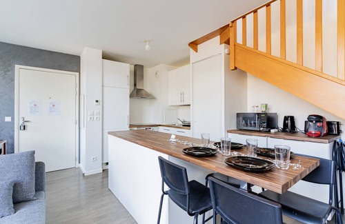 Corbeil-Essonnes Apartment | Urban Pool Duplex with Billiards and Private Terrace