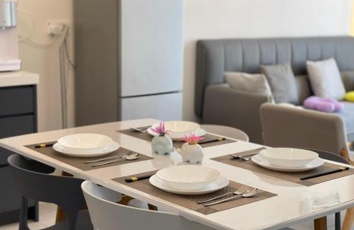 George Town Apartment | Oceanfront Oasis: Dolphin's Home with Pool & Perfect Rating