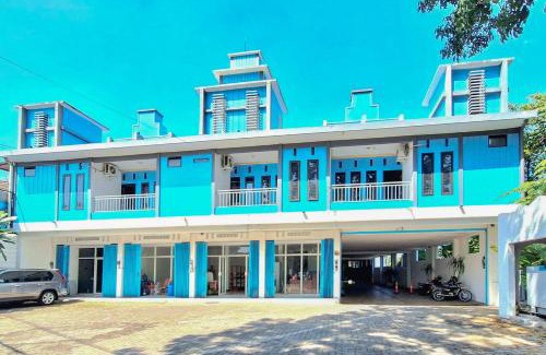 Sidomulyo Hotel | Comfort and Breakfast at OYO 90396 The Halona Villa Batu