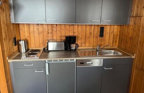 Grainet House | Idyllic Cabin Retreat with Sauna for Families and Pets