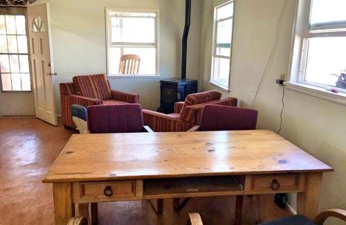 Yucca Valley House | Rustic Cabin Rental Surrounded by the Mojave Desert in Yucca Valley, California