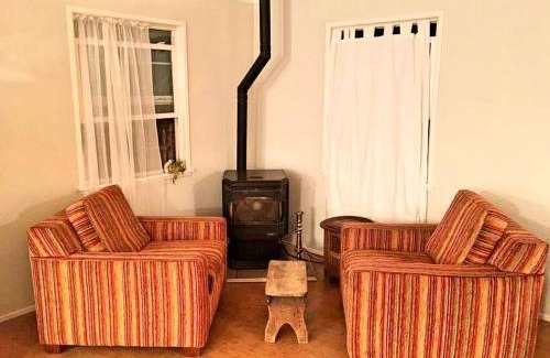 Yucca Valley House | Rustic Cabin Rental Surrounded by the Mojave Desert in Yucca Valley, California