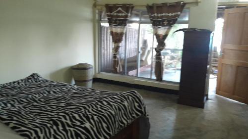 Pangani Cabin | Ushongo Beach Bandas: Oceanfront Retreat with Pet-Friendly Perks