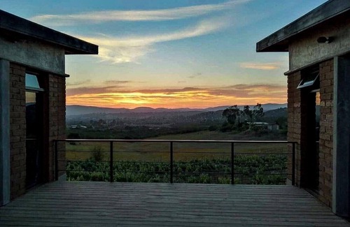 San Antonio de las Minas Cabin | Eco-Retreat UvaUva: King Bed & Balcony with Child-Friendly Amenities