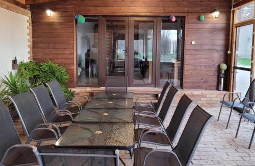 Magyarboly House | Top-Rated Végvári Vendégház with Family Amenities & Hot Tub