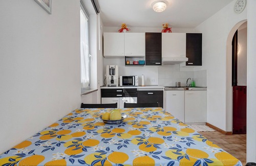 Dorsino Apartment | Scenic Vacation Apartment Ciclamino with Garden & Wi-Fi