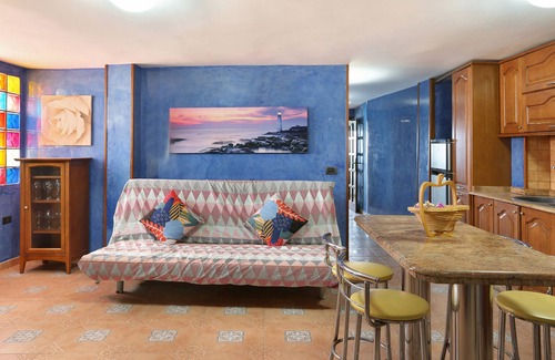Pozo Izquierda Apartment | Oceanfront Pozo Beach A Apartment with Wi-Fi & Sea View