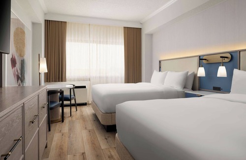 White Plains Hotel | Unforgettable Getaway: Pet-Friendly Units with Free Shuttle