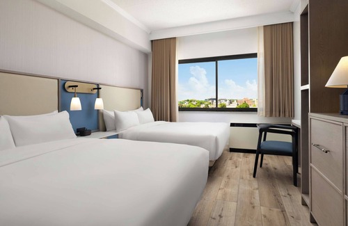 White Plains Hotel | Unforgettable Getaway: Pet-Friendly Units with Free Shuttle