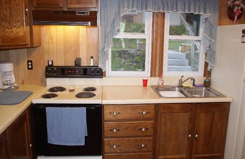 Meredith Cottage | Relax and Unwind at Big Lake with Pool & Ocean Views
