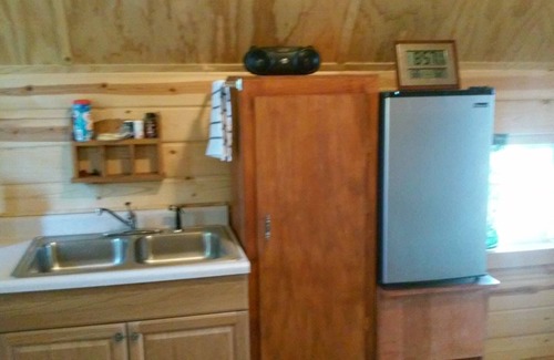 Columbia Falls Cabin | Peaceful Vacation Cabin on 5 Acres with Pond & Great Amenities