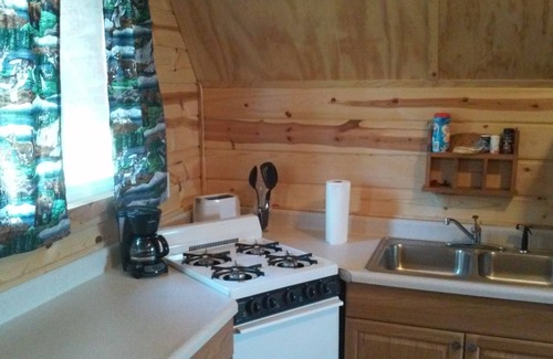 Columbia Falls Cabin | Peaceful Vacation Cabin on 5 Acres with Pond & Great Amenities