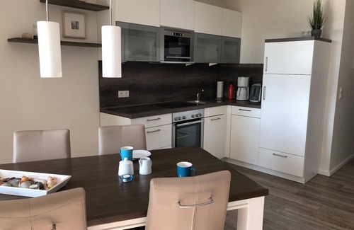 Neue Tiefe Apartment | Vacation apartment An der Waterkant with terrace in Haus Bürgermeister-Fox 44a on Fe