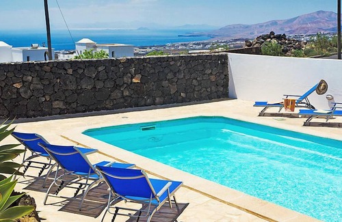 Conil House | Oceanfront Escape at Pelzer by Interhome: Spa & Poolside Bliss