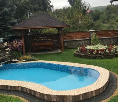 Snidavka Ski Chalet | Cozy Chalets in Yabluniv, Ukraine - Rated 9.9/10 with Pool