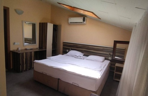 Akyaka City Center Apartment | Tranquil Vacation Home with Skylight near Akyaka Beach