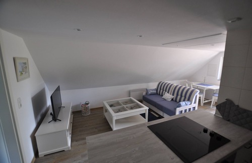 Wieck auf dem Darss Apartment | Escape to Strandgut: Cozy Apartment with Kitchen & Kids' Fun