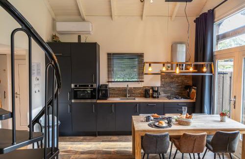 Municipality of Elburg Ski Chalet | Relaxing Retreat at Vakantiehuis Veluws with Sauna & Whirlpool