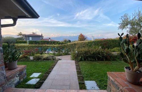 Manerba del Garda Apartment | Valentina's Home: Oceanfront Escape with Pool & Pet Friendly