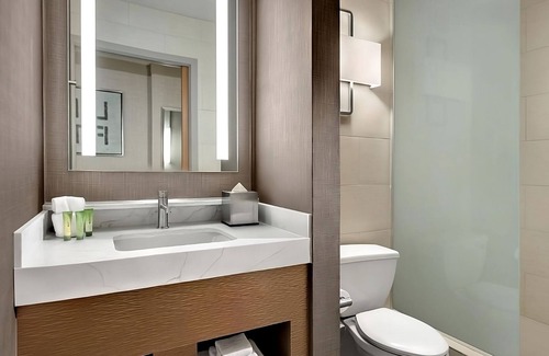 Gateway District Hotel | Budget-Friendly Retreat with Pools, Game Room & Parking