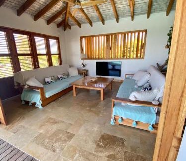 Grand-Bourg House | Cozy Oceanfront Escape at Vanille et Vahiné - 8.2/10 Rated