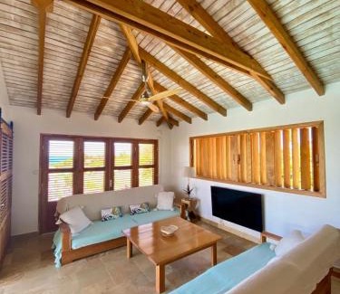 Grand-Bourg House | Cozy Oceanfront Escape at Vanille et Vahiné - 8.2/10 Rated