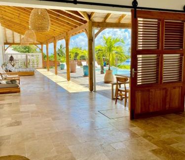 Grand-Bourg House | Cozy Oceanfront Escape at Vanille et Vahiné - 8.2/10 Rated