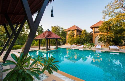Turiya Resort | Relax at Vannraj Resort And Spa: Pet Friendly & Poolside Fun