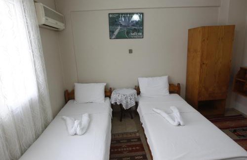 Selcuk House | Comfortable Vardar Pension: Family-Friendly with Pool Access