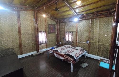 Maheshwar House | Budget-Friendly Vasant Bamboo Cottage with Breakfast & Play Area