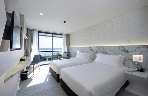 Nai Muang Hotel | Elegant VELA DHI Nakhon Phanom: 4-Star Stay with Pool & Hot Tub