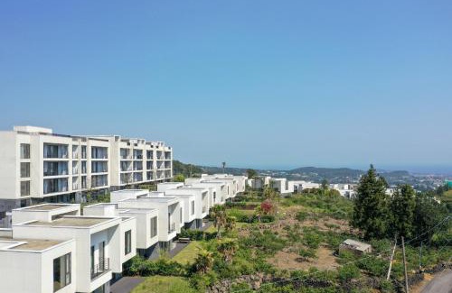 Seogwipo City Resort | Experience Velum Resort: Family-Friendly with Pool & Breakfast