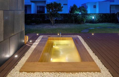 Seogwipo City Resort | Experience Velum Resort: Family-Friendly with Pool & Breakfast