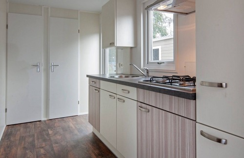 Voorthuizen Ski Chalet | Cozy Veluwe Lodge for Four with Private Pool & Ocean View