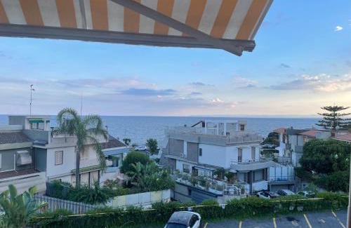 Cannizzaro Apartment | Beachfront Venusilia Apartment with Ocean Views
