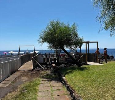 Cannizzaro Apartment | Beachfront Venusilia Apartment with Ocean Views