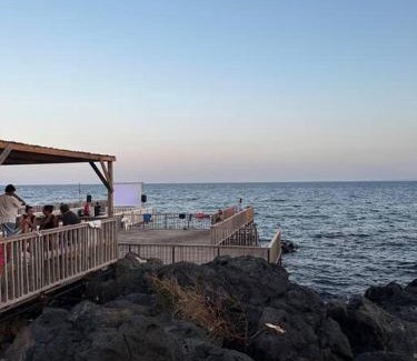 Cannizzaro Apartment | Beachfront Venusilia Apartment with Ocean Views