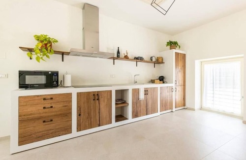 Mezzane di Sotto Apartment | Relax in VerdeOlivo1876: Ground Floor Ocean View Retreat