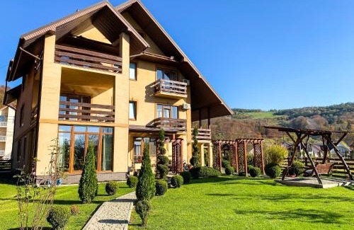 Solochyn House | Explore Veronika: Family-Friendly Stay with Kitchen Access