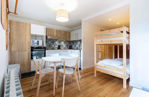Le Praz Apartment | Bright Oasis with Balcony, Close to Slopes & Family-Friendly