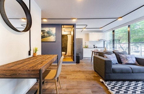 Hipodromo Apartment | Modern 2BR Condesa Retreat with Gym, Wifi & Rooftop Access