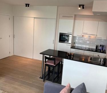 De Kaaien Apartment | Cozy Apartments in Antwerpen with Oceanfront Views