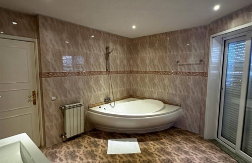 Guimaraes House | Top-Rated VHostel: Enjoy Poolside Relaxation & Spa