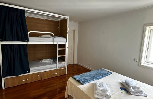 Guimaraes House | Top-Rated VHostel: Enjoy Poolside Relaxation & Spa