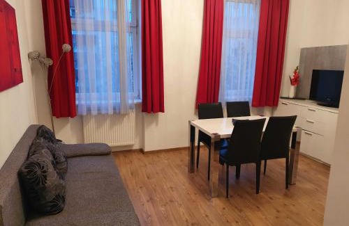 Erdberg Apartment | Budget-Friendly Vibrant Red Apartment with Breakfast Included