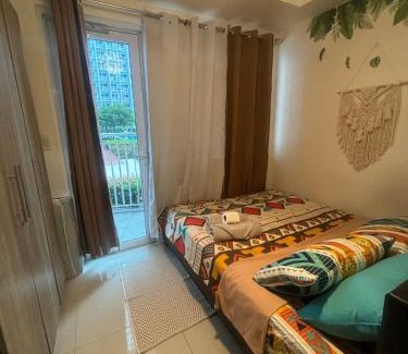 Bel-Air Apartment | Vibrant Tropical Oasis in SMDC Jazz Makati