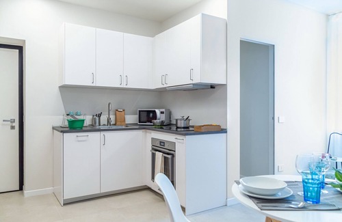 Pavia Apartment | Relaxing Retreat at VickyLù with Spa and Family Amenities
