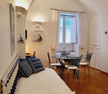 Atrani Apartment | Oceanfront Vicolo 23 House: Guest Rated 9.6 with Family Comfort